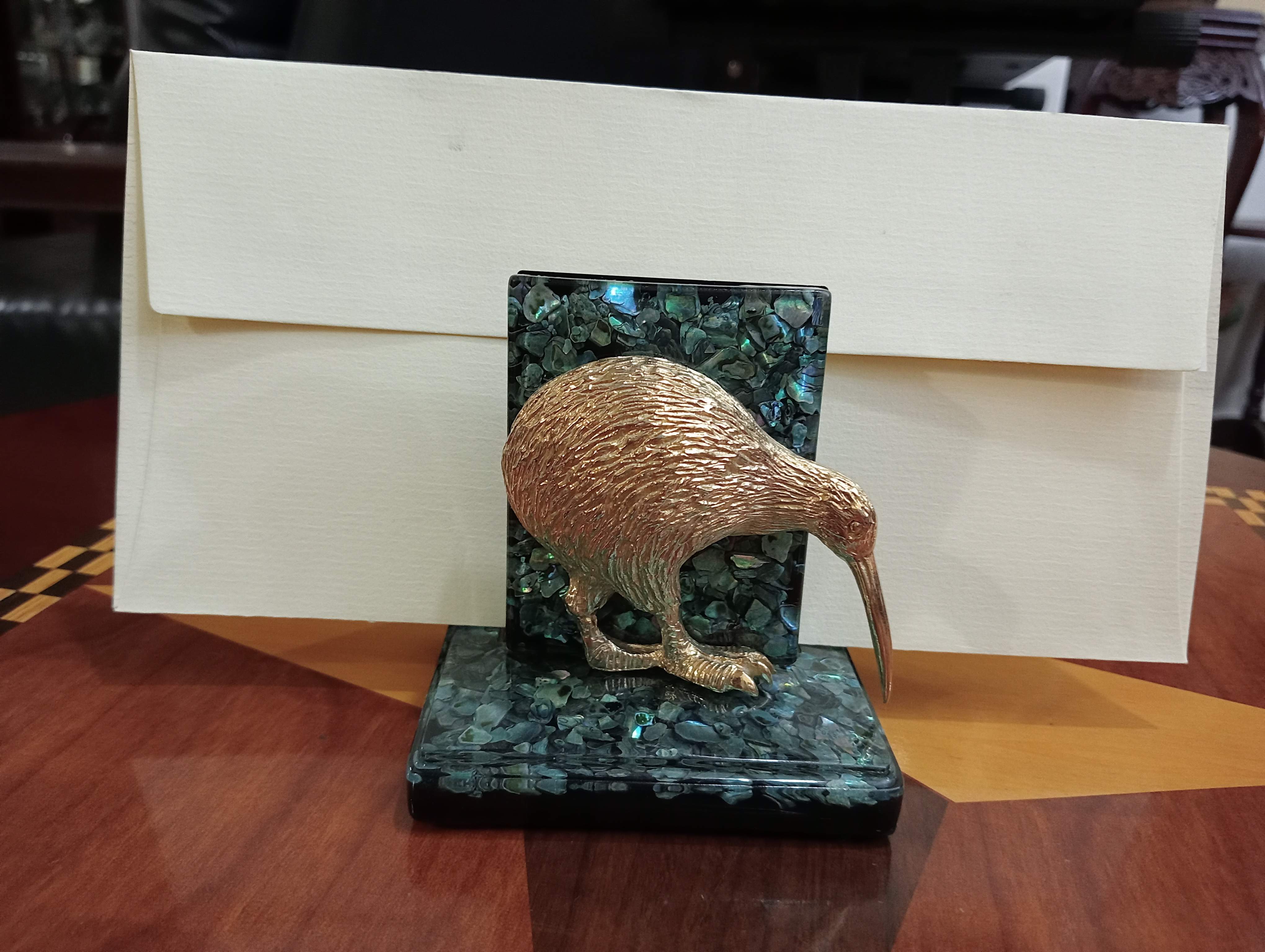 A brass and malachite letter holder.