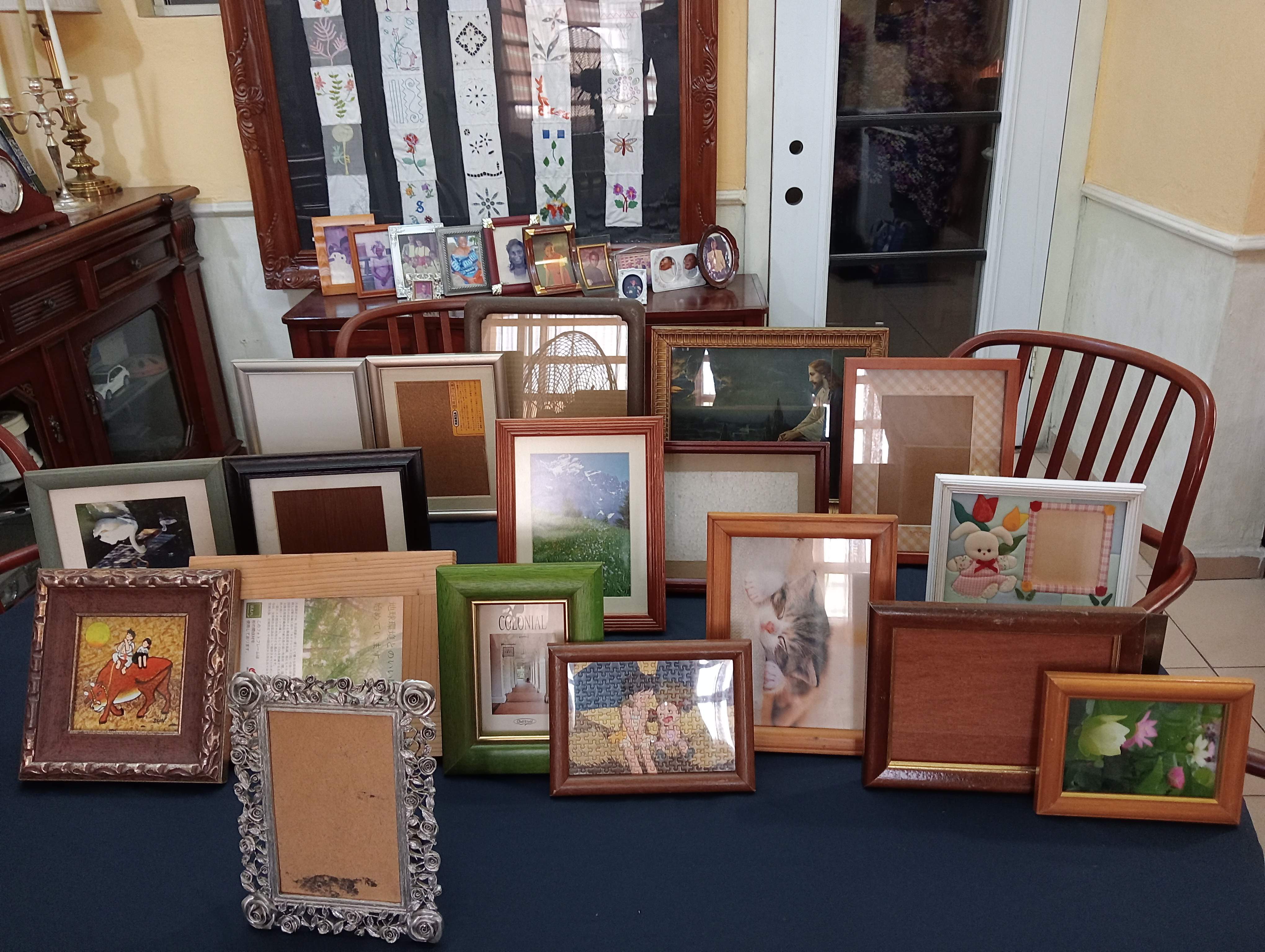 Picture frames of all sizes, wood, pewter and stainless steel.